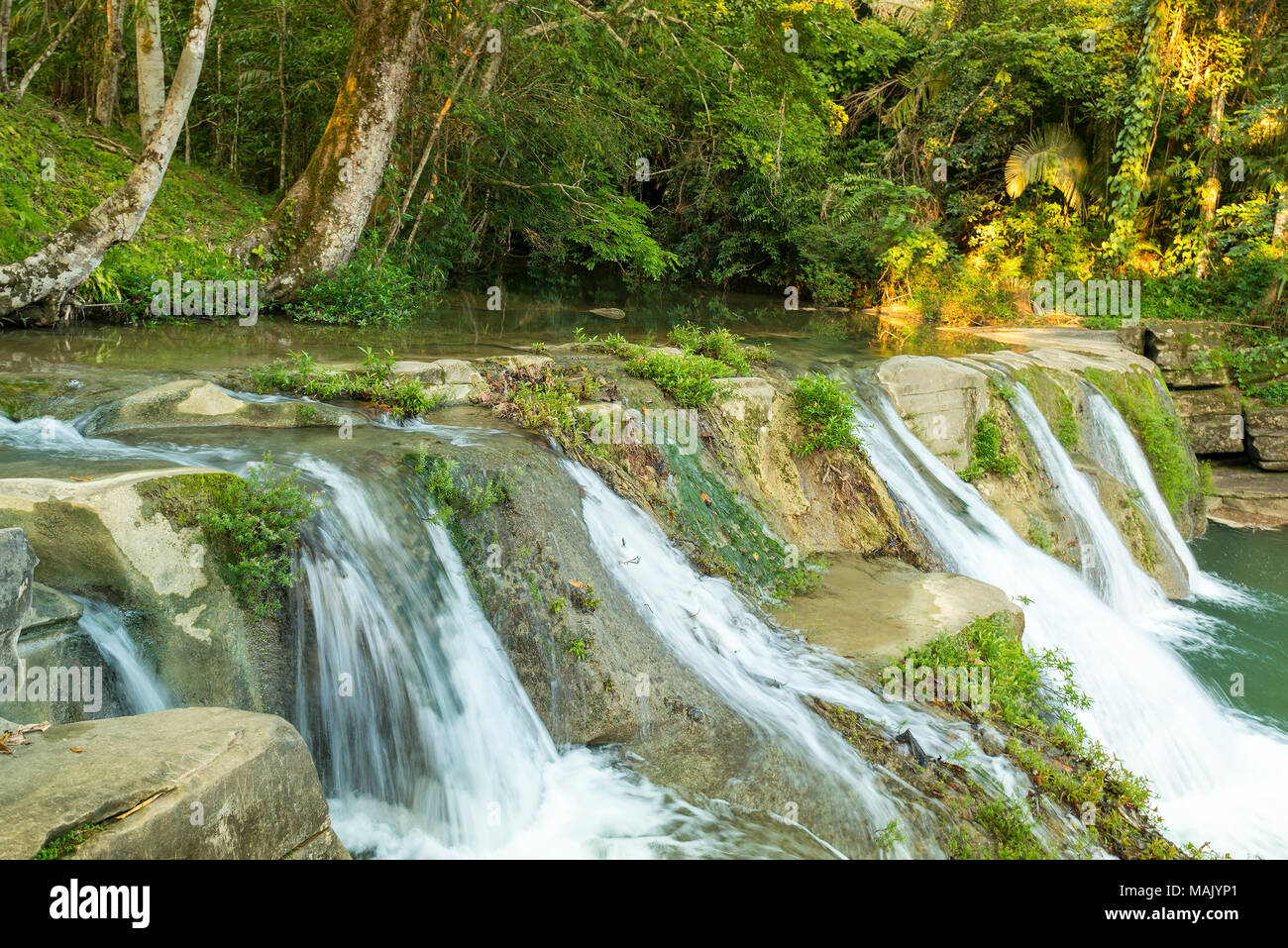 Natural water cascades of San Antonio waterfall in Toledo Belize Stock Photo