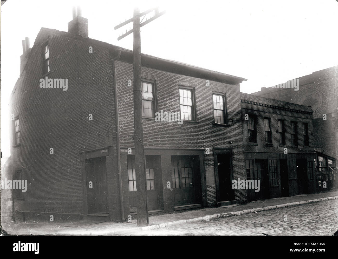 Title: Corner of First and Spruce Streets.  . circa 1910. Oscar C. Kuehn Stock Photo