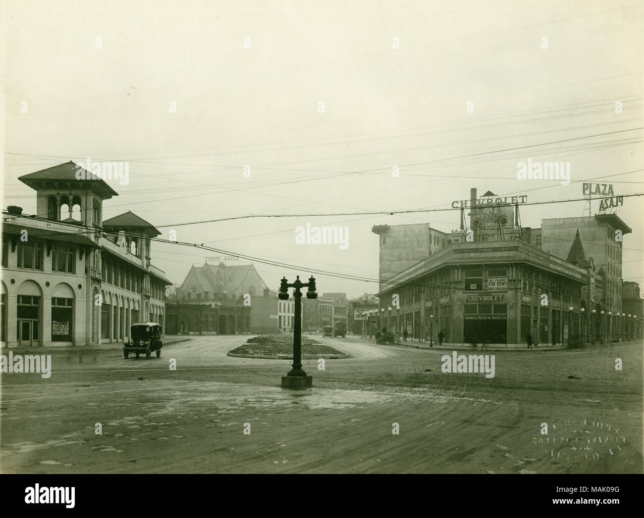 Locust Street at Lindell Boulevard Cutoff. Prominently featured is the