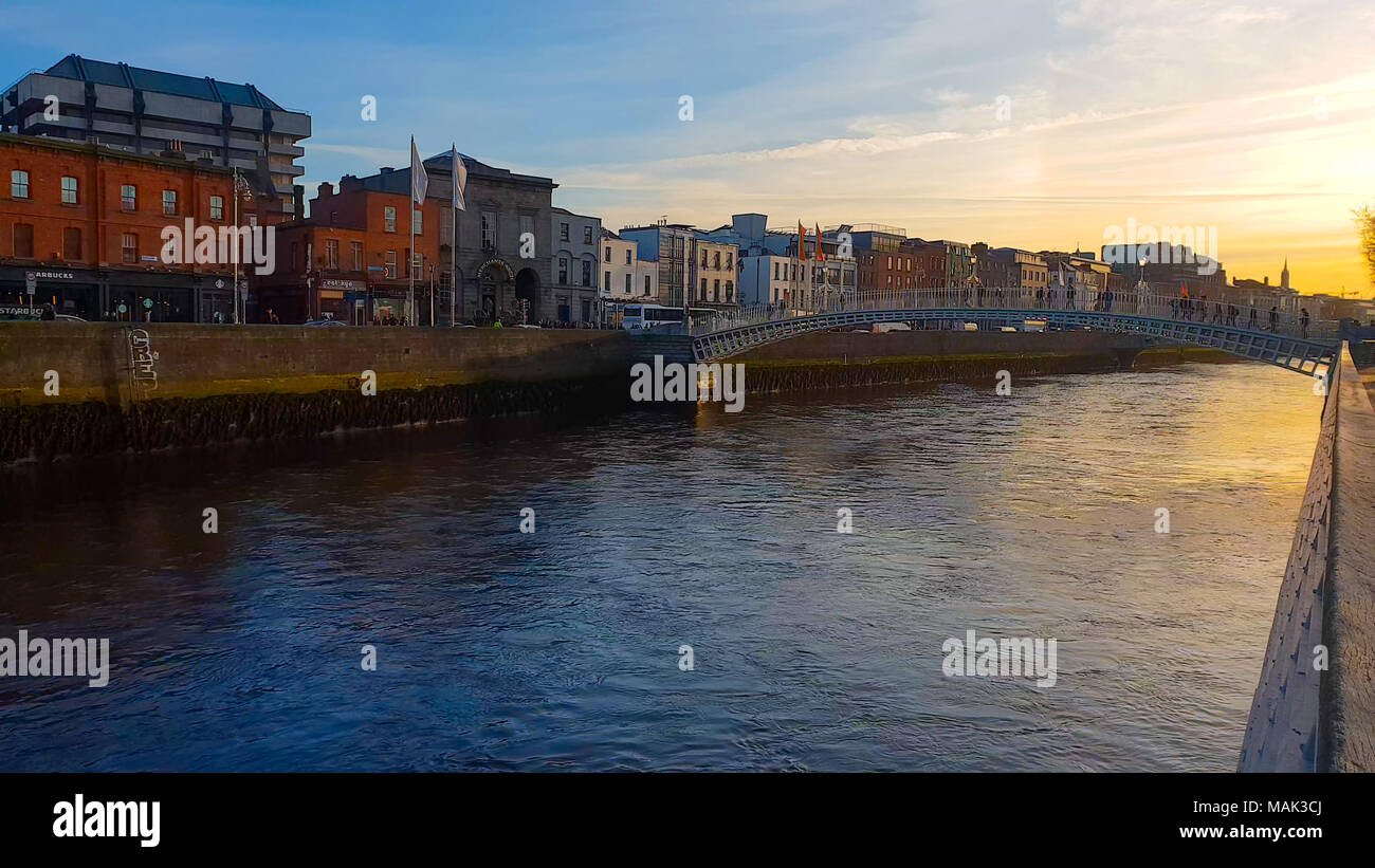 River Liffey in Dublin at sunset - DUBLIN / IRELAND - MARCH 20, 2018 ...