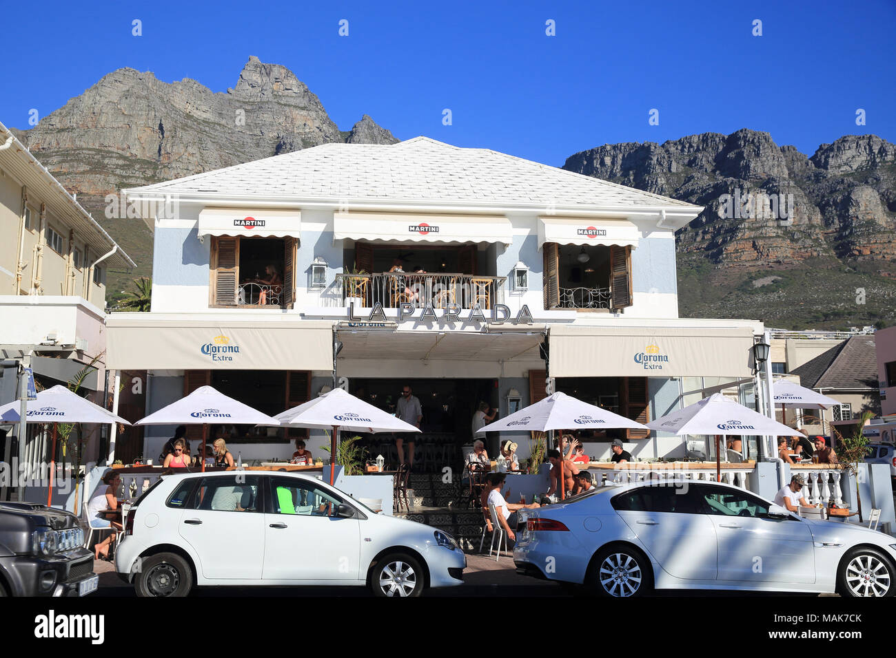 La Parada restaurant on Victoria Road, across from the white sands of Camps Bay beach, in Cape Town, South Africa Stock Photo