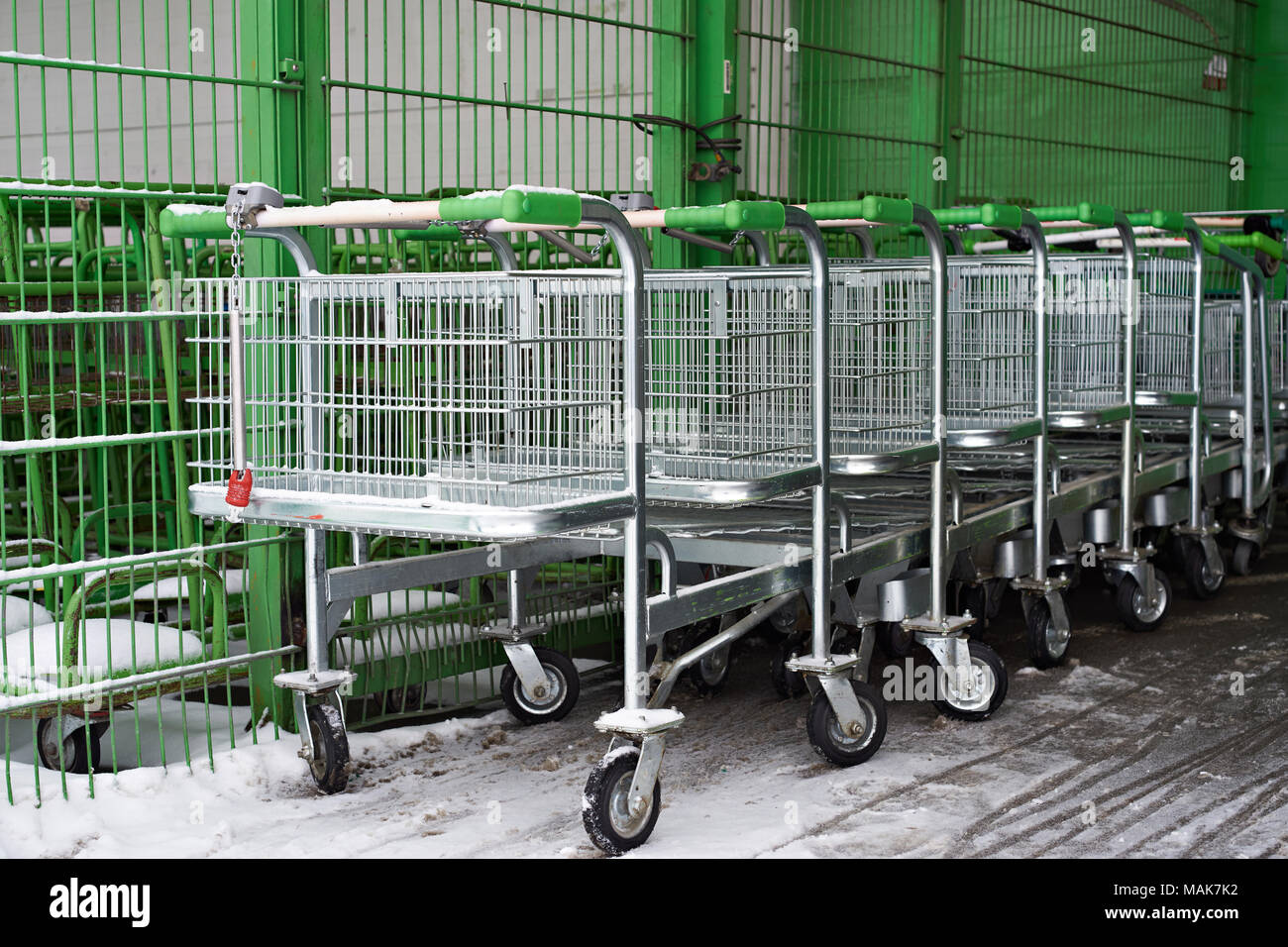 Carts for goods in supermarket Stock Photo