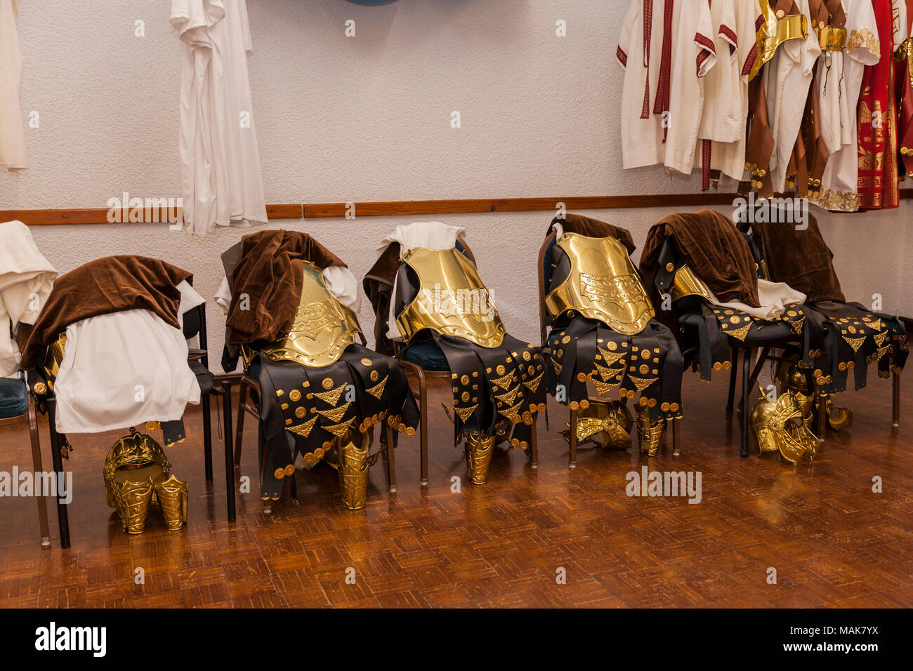 Roman soldier costumes with brass coloured breastplates in the dressing room for the Passion play, Adeje, Tenerife, Canary Islands, Spain Stock Photo