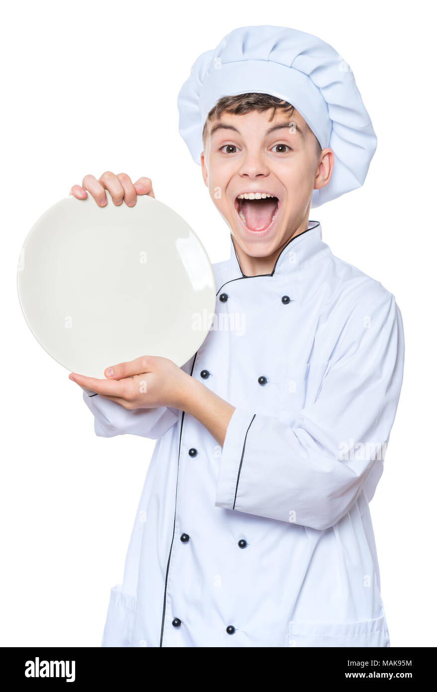 Teen boy wearing chef uniform Stock Photo Alamy