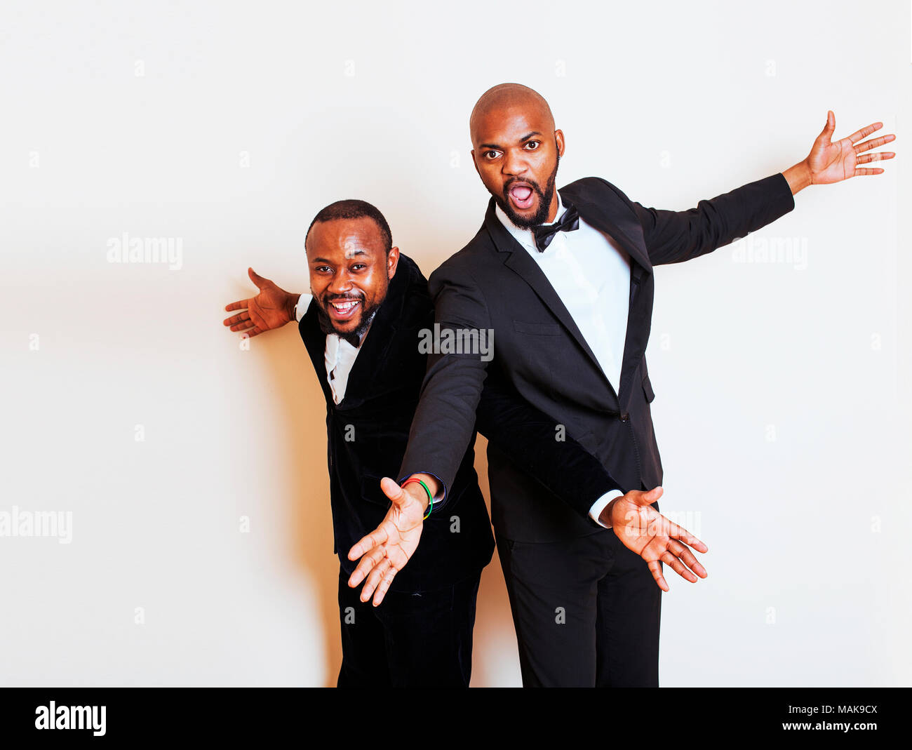 two afro-american businessmen in black suits emotional posing, g Stock ...