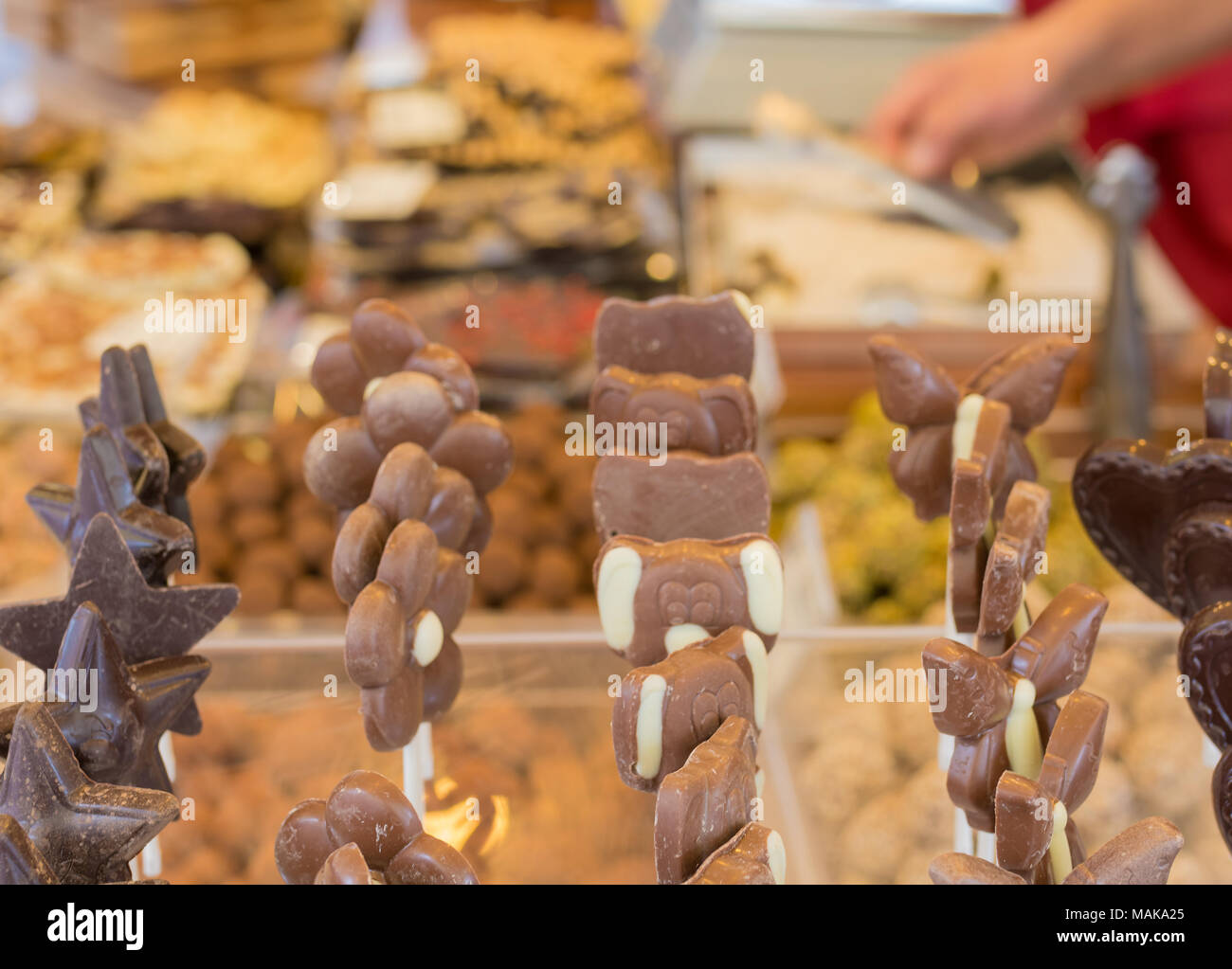 Chocolate sweets in the foreground and the chocolate market background Stock Photo
