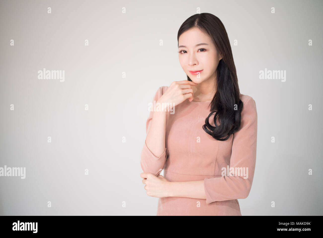 Beautiful asian woman happy smile with casual clothes on white background. Smart, beautiful, mature, calm asian woman concept. Asian woman with korean Stock Photo