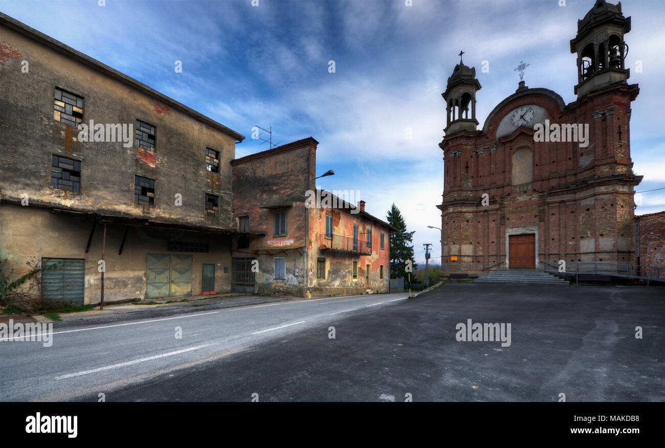 Surie of Clavesana. where you can still see the signs of a bar, a restaurant and a mechanic workshop completely abandoned. Stock Photo