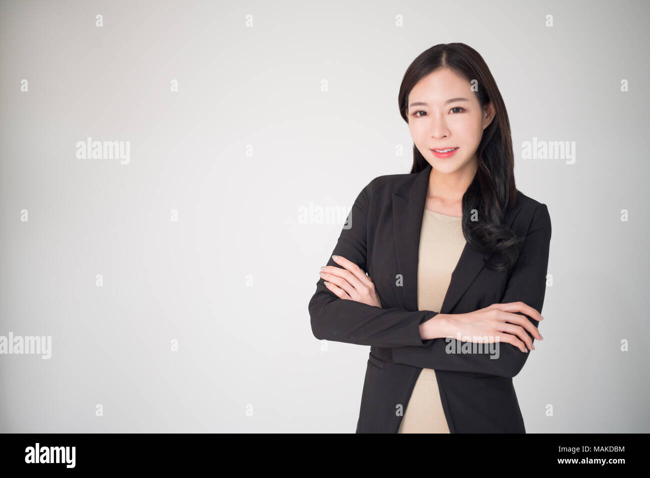 Asian business woman happy smiling isolated on white background. Beautiful, pretty, professional, happy, confident asian business woman concept. Busin Stock Photo