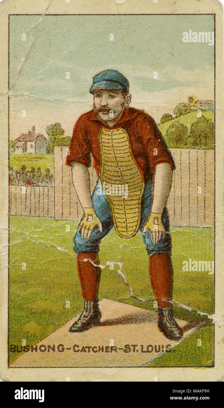 Vertical, color illustration of Bushong on a baseball card. He is wearing blue pants and a red shirt and socks. His hat is also blue. He is wearing gloves and padding over his chest. He has a mustache. He is posed in front of a fence with a house in the background. Below reads 'Bushong - catcher - St. Louis.' The back reads 'We will pack in the celebrated GOLD COIN CHEWING TOBACCO, the portraits of all the leading base-ball players, police inspectors and captains, jockeys, and actors in the country in full uniform and costume. Continue to save the wrappers. They are valuable.' Title: Buchner G Stock Photo