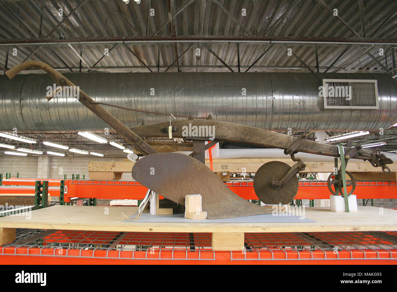 Moldboard plow used on a farm along the Meramec River. Wooden beam and