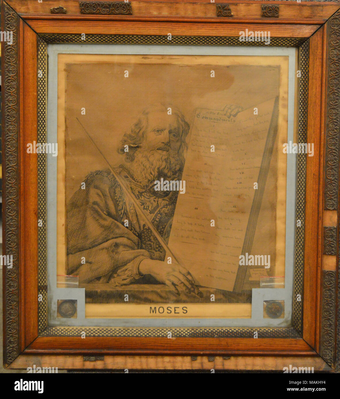Pen and ink drawing entitled 'Moses,' showing him holding the Ten Commandments. The work was completed by Joseph P. Hortiz of St. Louis. It is framed with two silver medals awarded Hortiz for Ornamental Penmanship and Best Metalic Pencils at the Second Annual St. Louis Agricultural and Mechanical Fair in October 1857. Title: Drawing, 'Moses' by Joseph P. Hortiz with Prize Medals  . between 1854 and 1857. Hortiz, Joseph P., 1827-1859 Stock Photo