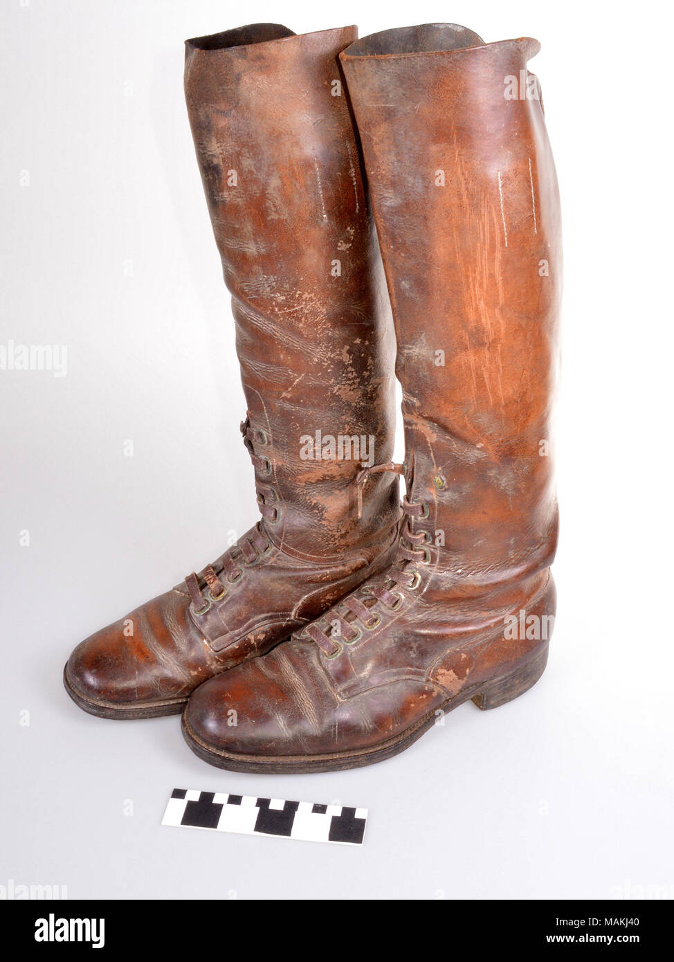 World War I French Uniform leather boots of Joseph Desloge. Desloge volunteered for World War I service in January 1917 and was attached to the French Army as an ambulance driver. He later enlisted in the French Army and served as an artillery liaison officer with the 11th Artillery Regiment. He was decorated for valor for his actions near Voziers. Title: World War I French Uniform Boots of Joseph Desloge  . between 1917 and 1919. Stock Photo