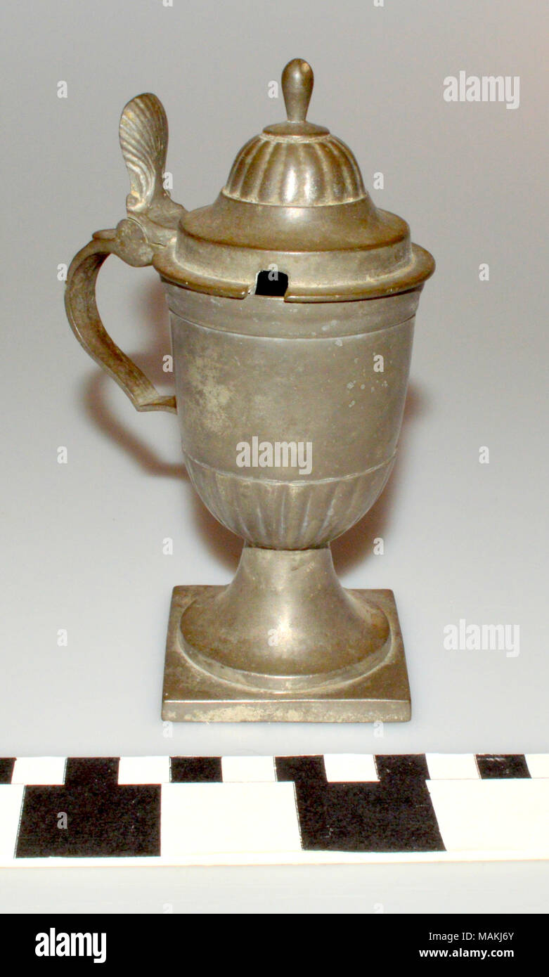 Metal mustard pot with hinged lid. Title Metal Mustard Pot . circa