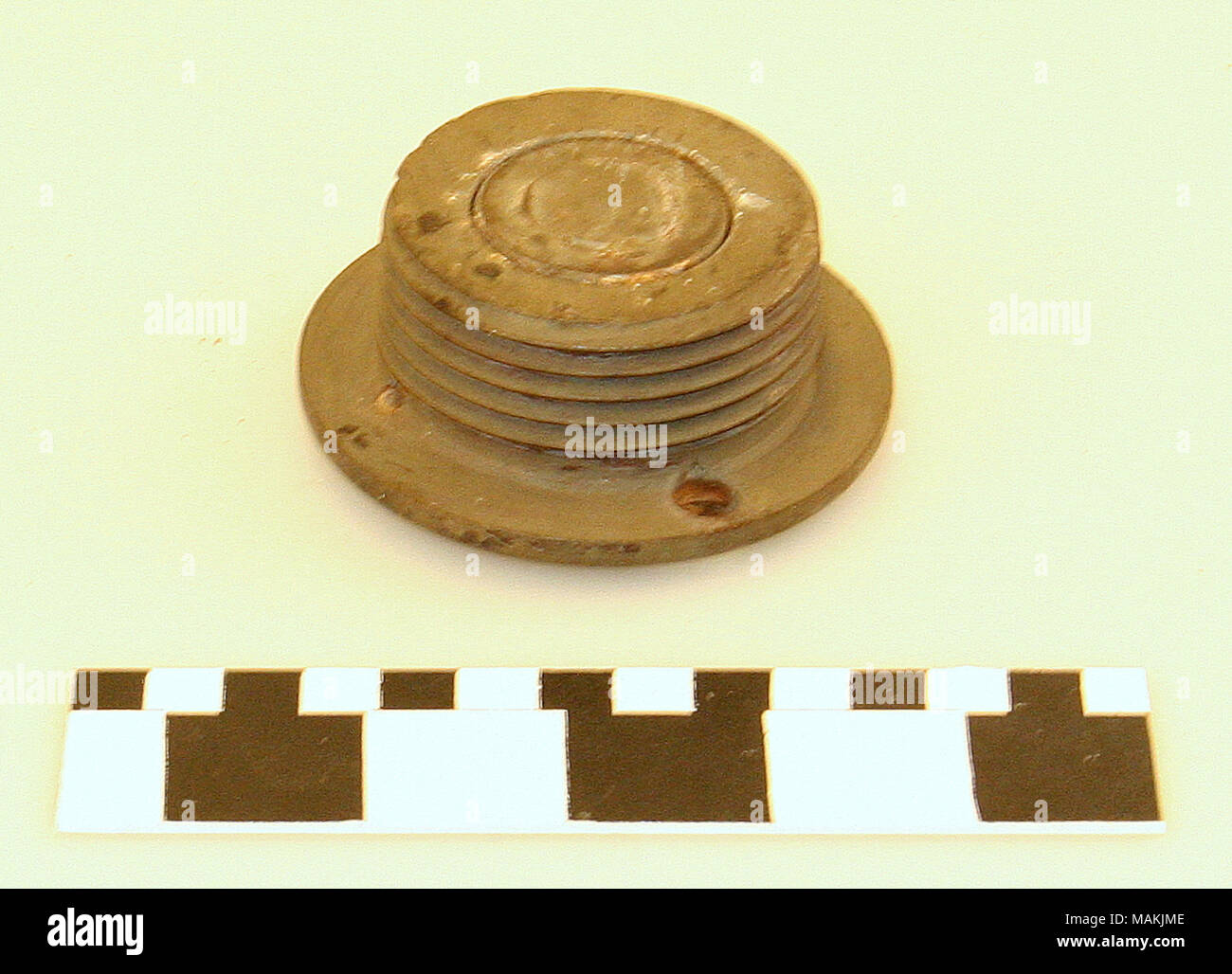 Patent Model (Patent No. 70,024) of a bung for barrels; patented Oct. 22, 1867 by John Ruegg; first listed in the 1851 St. Louis Directory; last listed in the 1893 Directory; wife, Charlotte, listed as his widow in the 1894 Directory. Title: Patent Model for a Barrel Bung  . 1867. John Ruegg Stock Photo