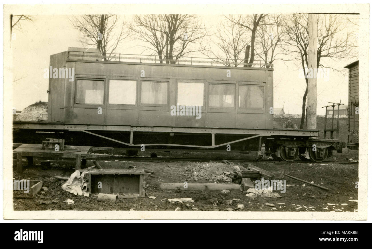 Horizontal, black and white photograph of a passenger compartment set on a flatcar. The photograph is located in the St. Louis 12th Engineer's Regiment album, on pg. 16. The Saint-Mihiel Salient was a triangular area of of land in France, between Verdun and Nancy, and was occupied by the German army since fall of 1914. Acquisition of this salient area was strategically important because rail communications between Paris and the eastern sections of the war front were hindered under German occupation. The final Allied offensive of the war could not begin until control of the salient was acquired Stock Photo