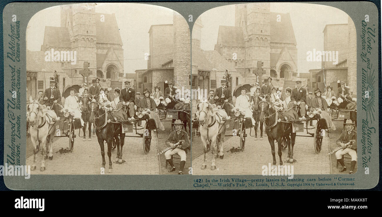Title: 'In the Irish Village - pretty lassies in jaunting cars before 'Cormac Chapel' - World's Fair, St. Louis, U.S.A.' [Louisiana Purchase Exposition]. U and U 42.  . 1904. Underwood and Underwood Stock Photo