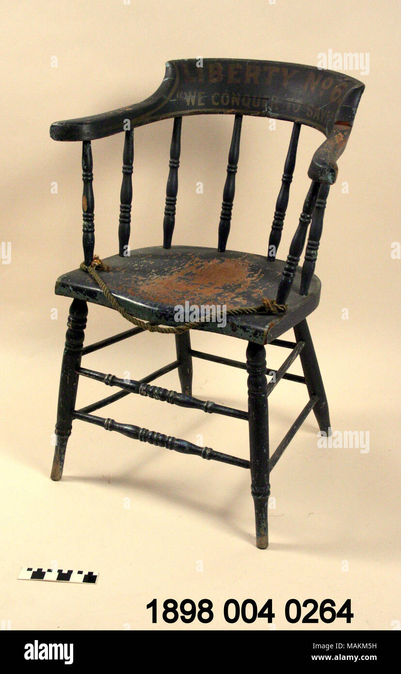 Windsor style fireman's chair from Liberty Fire Co. Title: Fireman's chair from Liberty Fire Co. No. 6  . circa 1850. Stock Photo