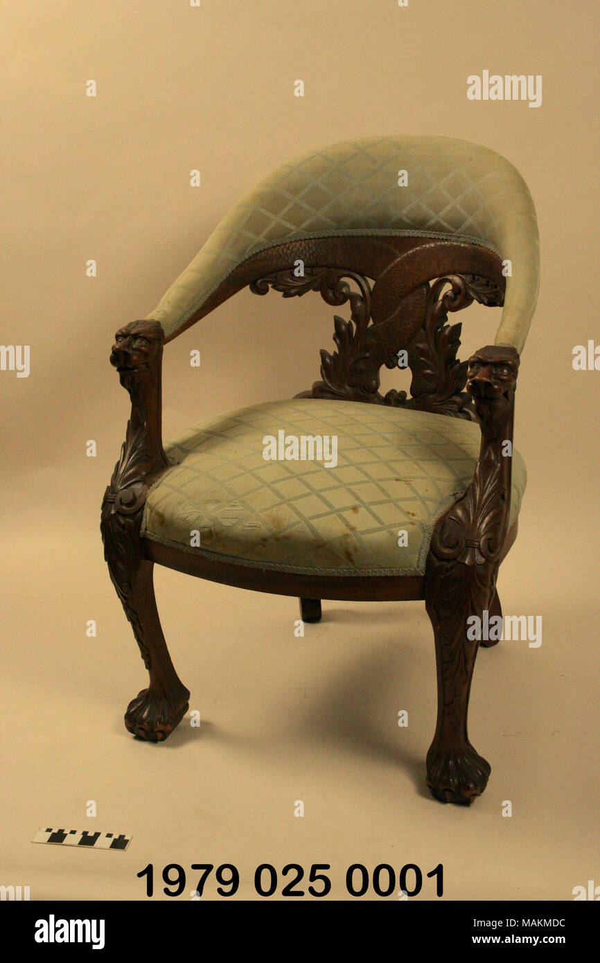 Chair with carved dragon motif purchased at the end of the 1904 World's fair by John and Mary White Scudder. Title: Carved and Upholstered Chair from the Chinese Pavilion of the 1904 World's Fair  . 1904. Stock Photo