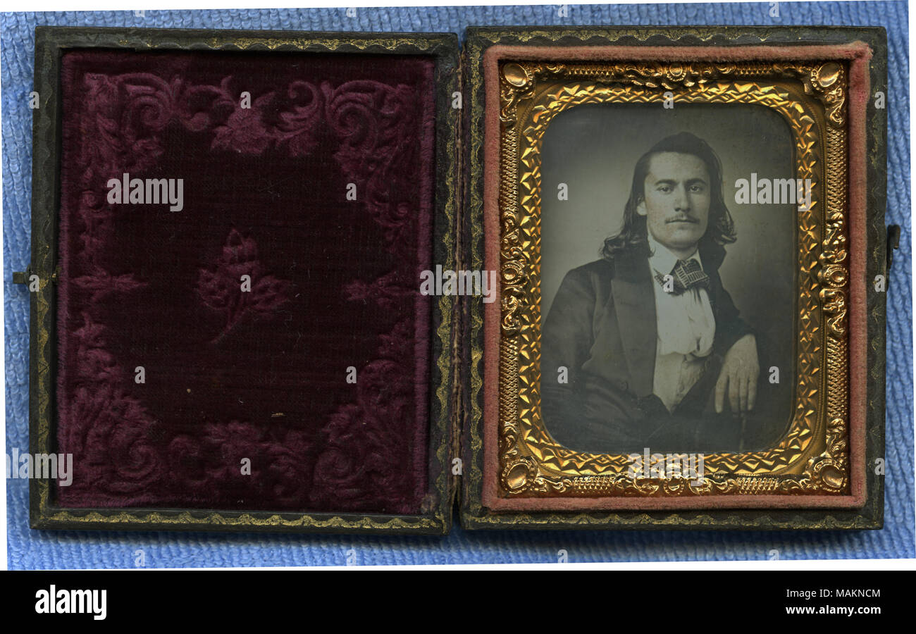 Cased daguerreotype showing a man with a mustache and shoulder-length hair wearing a suit with his arm resting on the back of the chair he is seated in. MacDonald was a Confederate officer with the Missouri State Guard who was among those arrested at Camp Jackson. He was the only prisoner taken who refused parole, which included pledging not to take arms against the United States. He was released by the United States District Court on a writ of habeas corpus. After his release, MacDonald rejoined the Missouri State Guard to fight at Wilson's Creek, Lexington, and Pea Ridge. In mid-1862 he rais Stock Photo