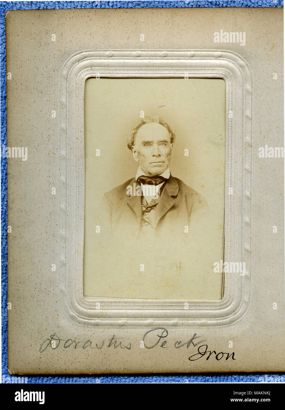 Bust portrait of a clean-shaven man in a suit facing forward. Three cent stamp on reverse side. 'Dorastus Peck Iron' (written below image on album page). Peck was a delegate from Iron County (24th senatorial district) to the Missouri State Convention held at the Mercantile Library in St. Louis from January 6 to 11, 1865. Title: Dorastus Peck.  . circa 1865. Mansfield's City Gallery, St. Louis Stock Photo