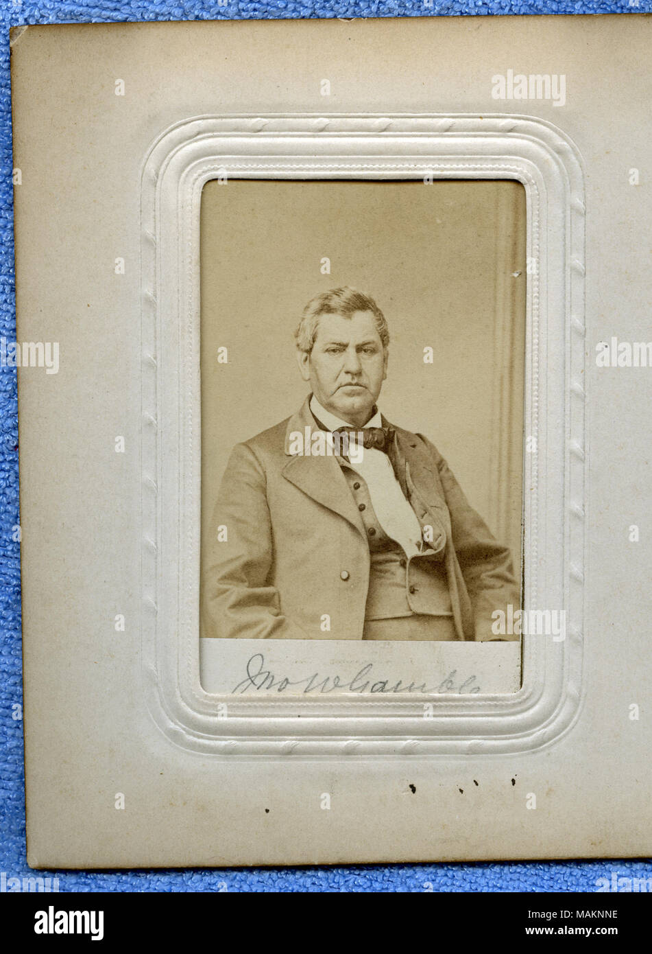 Half-length portrait of a clean-shaven man in a suit, sitting and turned to the right. 'Jno W Gamble' (written below image). Two-cent stamp on reverse side. Gamble was a delegate from Audrain County (2nd senatorial district) to the Missouri State Convention held at the Mercantile Library in St. Louis from January 6 to 11, 1865. Title: John W. Gamble.  . circa 1865. Mansfield's City Gallery, St. Louis Stock Photo