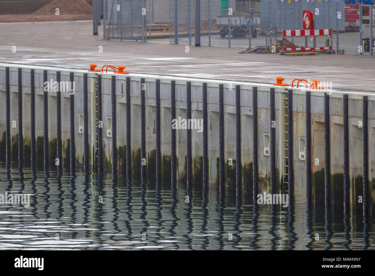 Detail of new modern quay of concrete with rubber bumbers Stock Photo