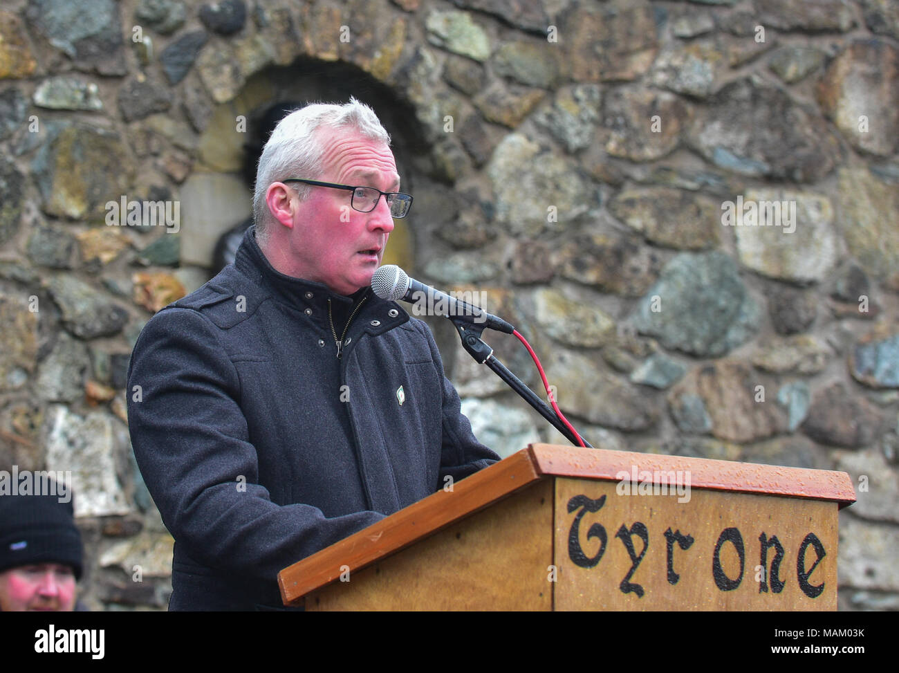 Carrickmore, UK. 2nd April, 2018. Tyrone National Graves Association official Eamon Hanna gives the opening speech at  the annual Commemoration took place in Carrickmore, on Easter Monday, upwards of 300 people attended the annual remembrance. Tyrone: UK: 2nd April 2018 Credit: Mark Winter/Alamy Live News Stock Photo