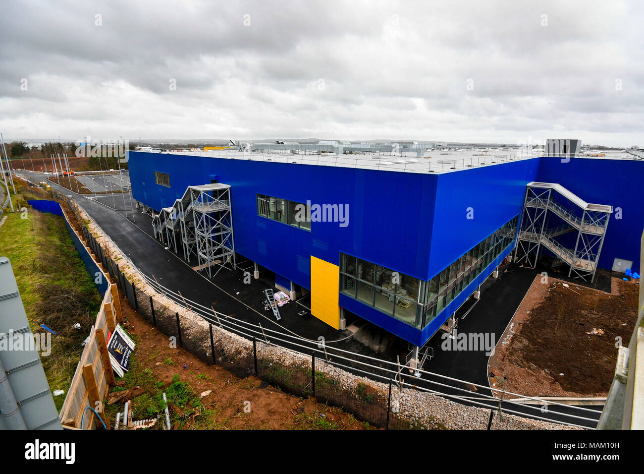 Exeter, Devon, UK. 2nd April 2018.  Constuction of the new £80 million IKEA store at Newcourt Way at Exeter in Devon approaching completion ahead it opening on 10th May.  Originally it was announced that it would open on May 1st but the opening has been delayed by 10 days due to the recent "Beast from the East" cold spells March.  It is the 21st IKEA store to open in the UK and will be the retailers most sustainable store to date.  Picture Credit: Graham Hunt/Alamy Live News Stock Photo