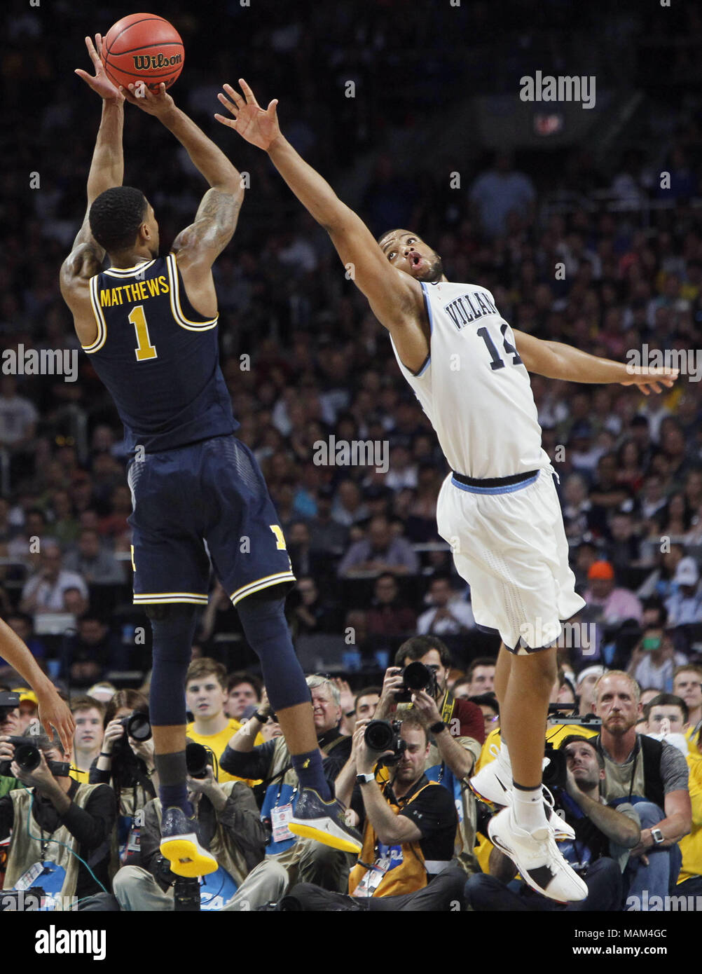 San Antonio, USA. 2nd Apr, 2018. Omari Spellman (R) of Villanova defends Charles Matthews of Michigan during the championship game of the Final Four NCAA college basketball tournament, in San Antonio, Texas, the United States, on April 2, 2018. Villanova claimed the title by defeating Michigan with 79-62. Credit: Song Qiong/Xinhua/Alamy Live News Stock Photo