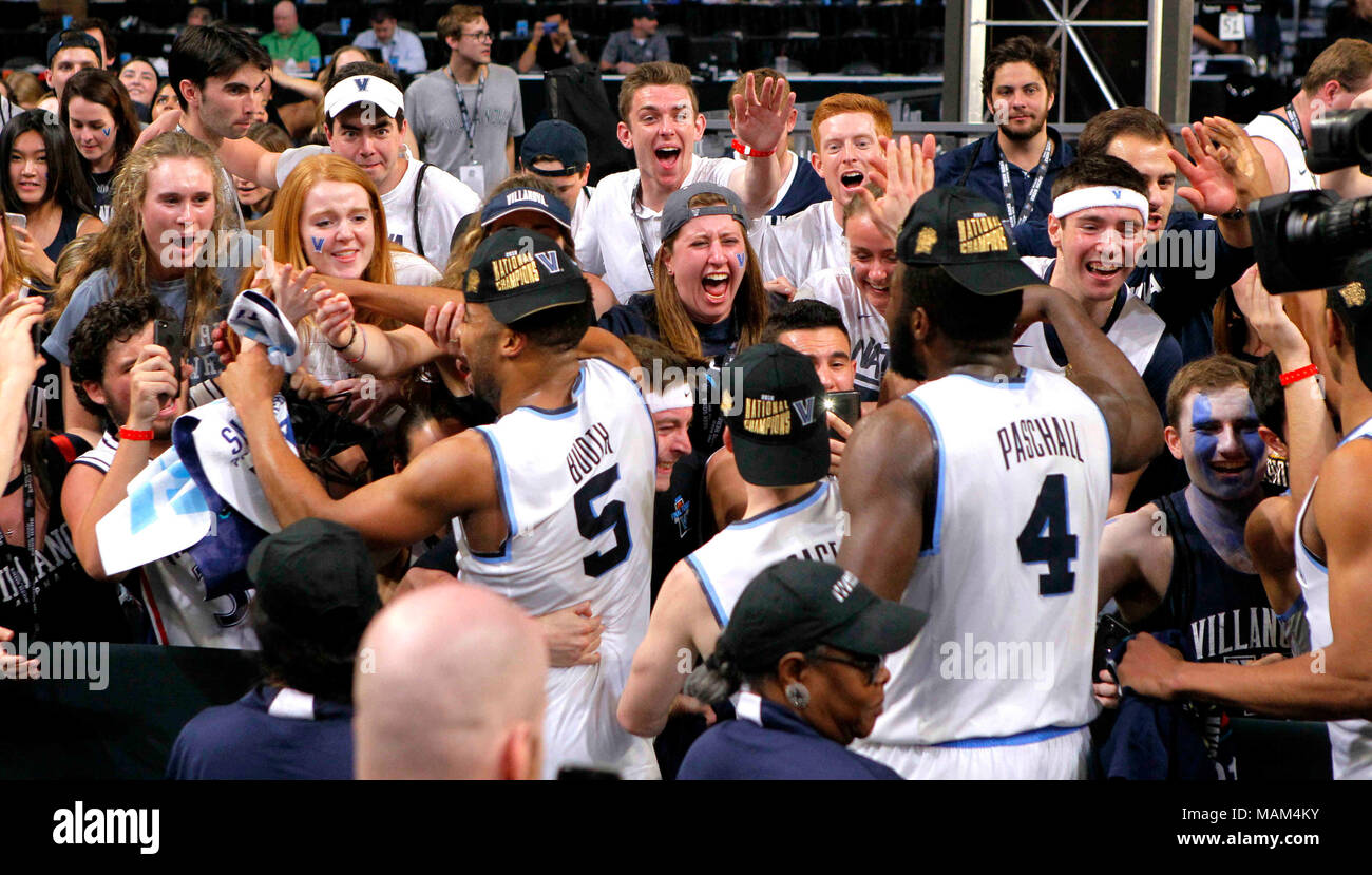 San Antonio, USA. 2nd Apr, 2018. Players of Villanova celebrate with supporters after beating Michigan with 79-62 in the championship game of the Final Four NCAA college basketball tournament, in San Antonio, Texas, the United States, on April 2, 2018. Credit: Song Qiong/Xinhua/Alamy Live News Stock Photo