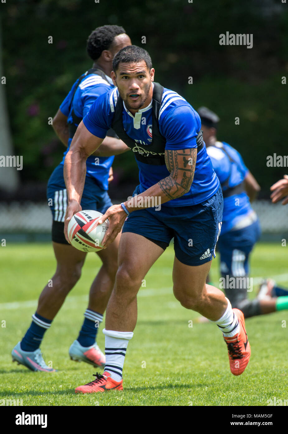 HONG KONG,HONG KONG SAR,CHINA:April 3rd 2018. The USA Rugby team conduct a training session at So Kon Po recreation ground ahead of their Hong Kong Rugby 7's matches. Martin Iosefo passes the ball during drills.Alamy Live News Stock Photo