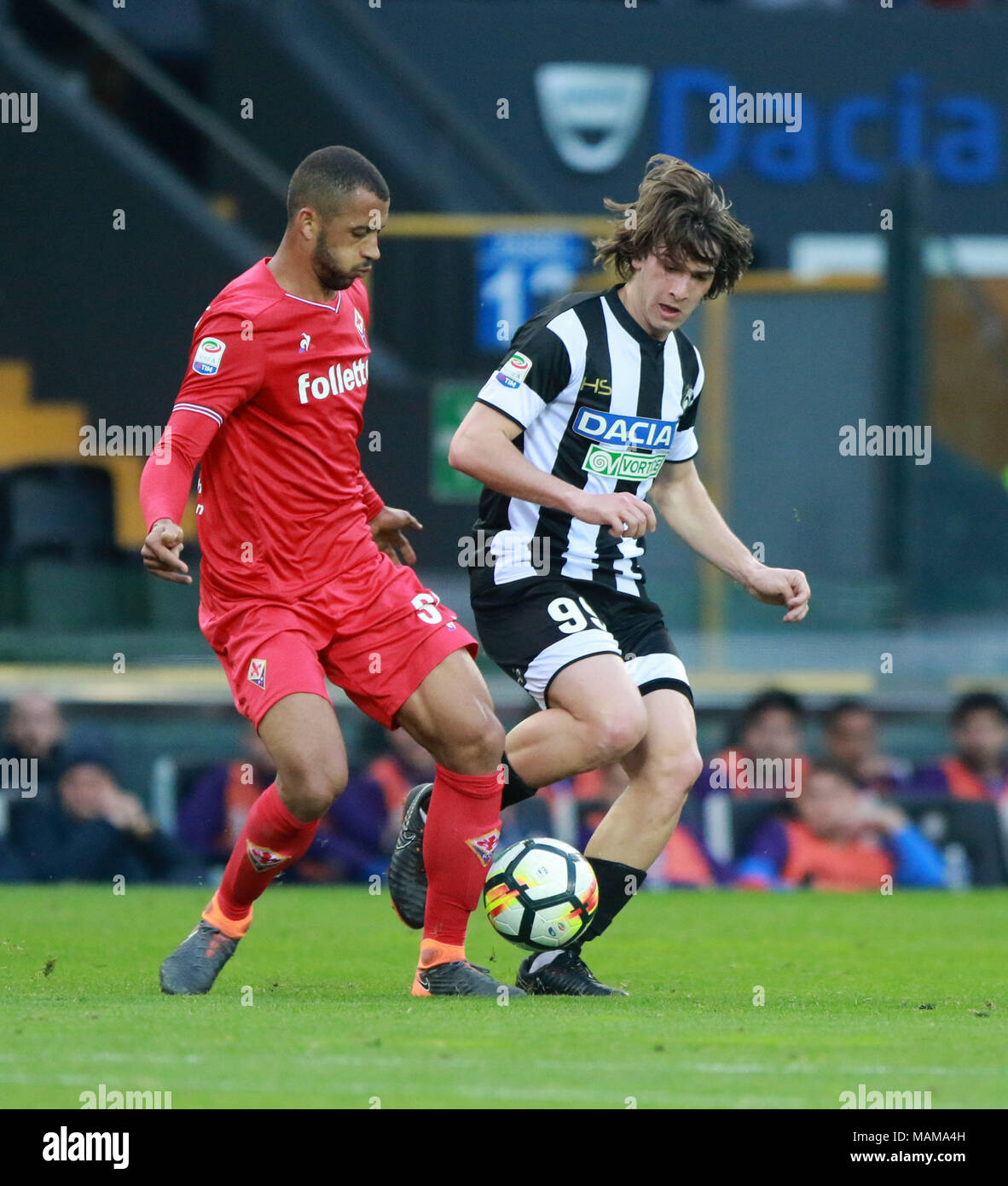 Udine, Italy. 3rd April, 2018. ITALY, Udine: Fiorentina's defender Vitor Hugo (L) vies with Udinese's midfielder Andrija Balic  (R) during the Serie A football match between Udinese Calcio v AC Fiorentina at Dacia Arena Stadium on 3rd April, 2018. Credit: Andrea Spinelli/Alamy Live News Stock Photo