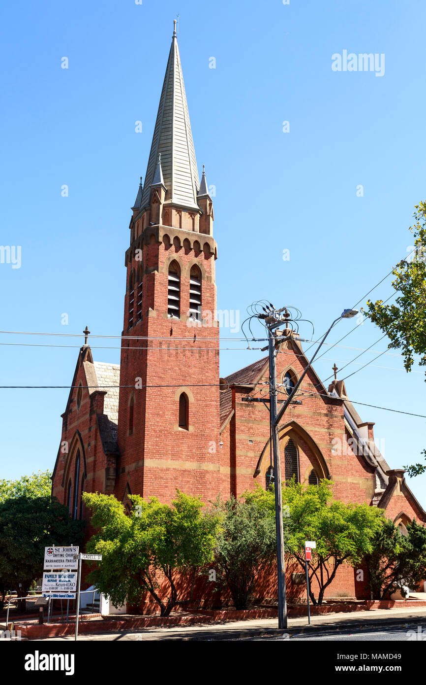 St John Uniting Church opened in 1908 and was built in Federation Gothic style with a cruciform roof plan and bell tower, in Narrandera, New South Wal Stock Photo