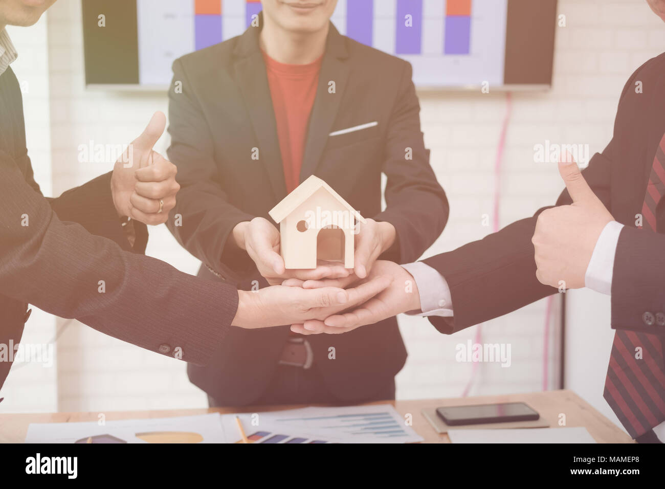 Housing company good teamwork, housing business concept Stock Photo - Alamy