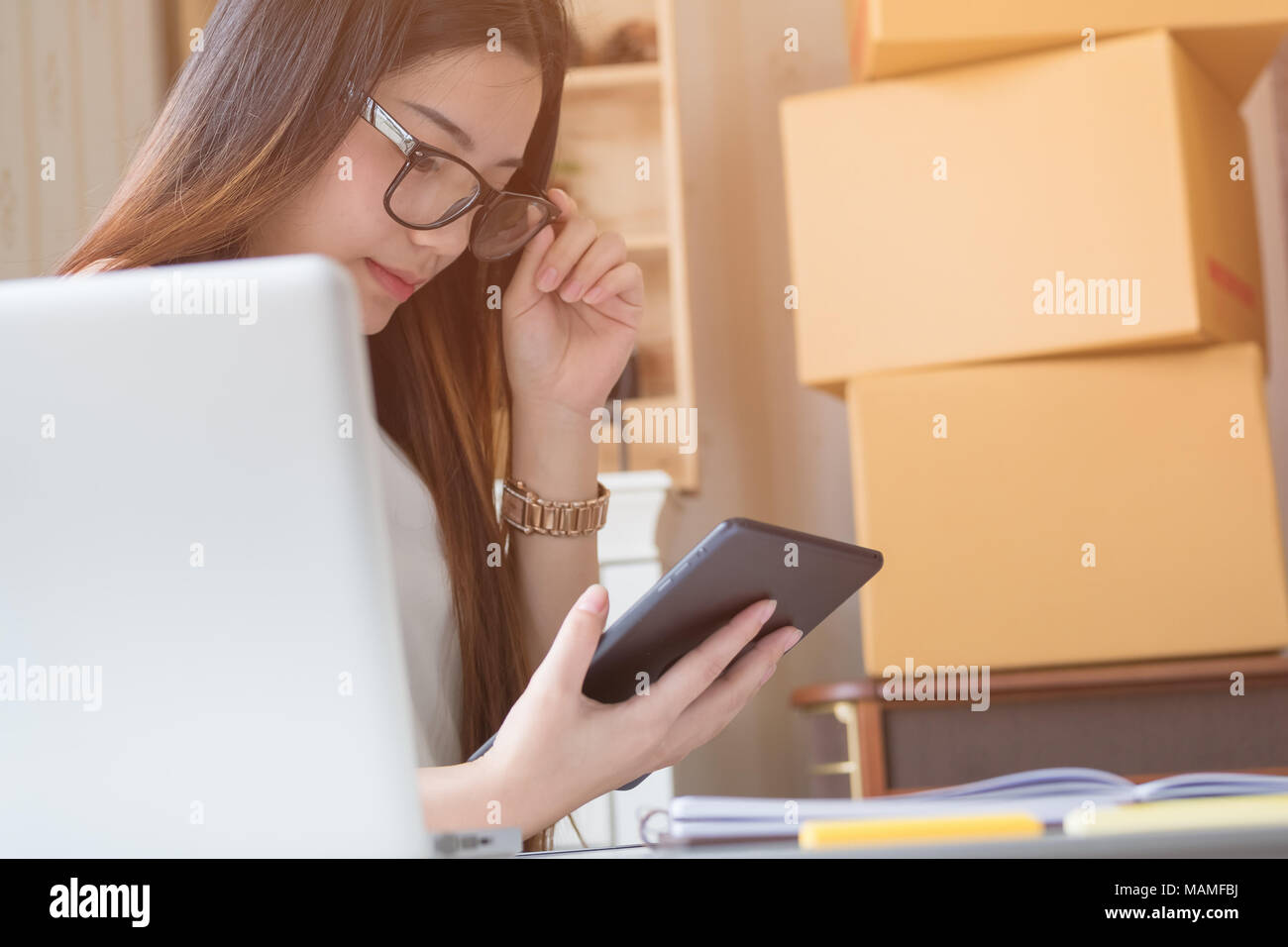 Happy Young Asian Woman Doing Online Shopping At Home Stock Photo Alamy