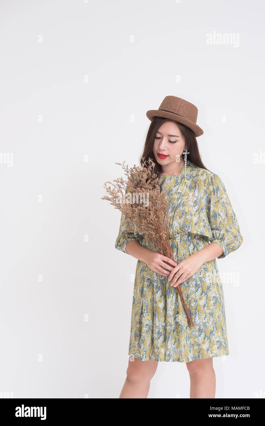 Beautiful young Asian woman with vintage style clothes Stock Photo