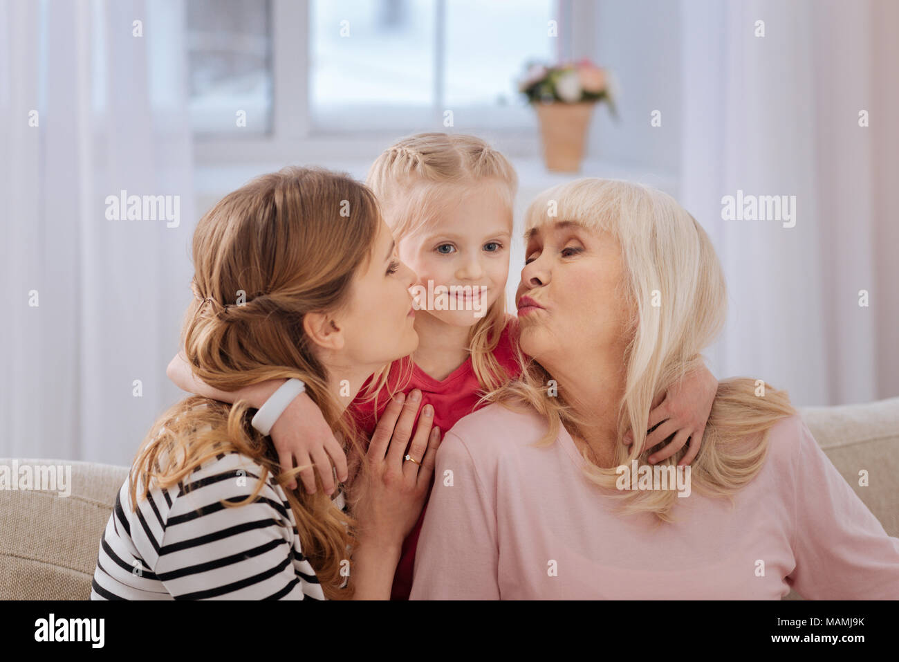 Nice pretty girl being kissed Stock Photo