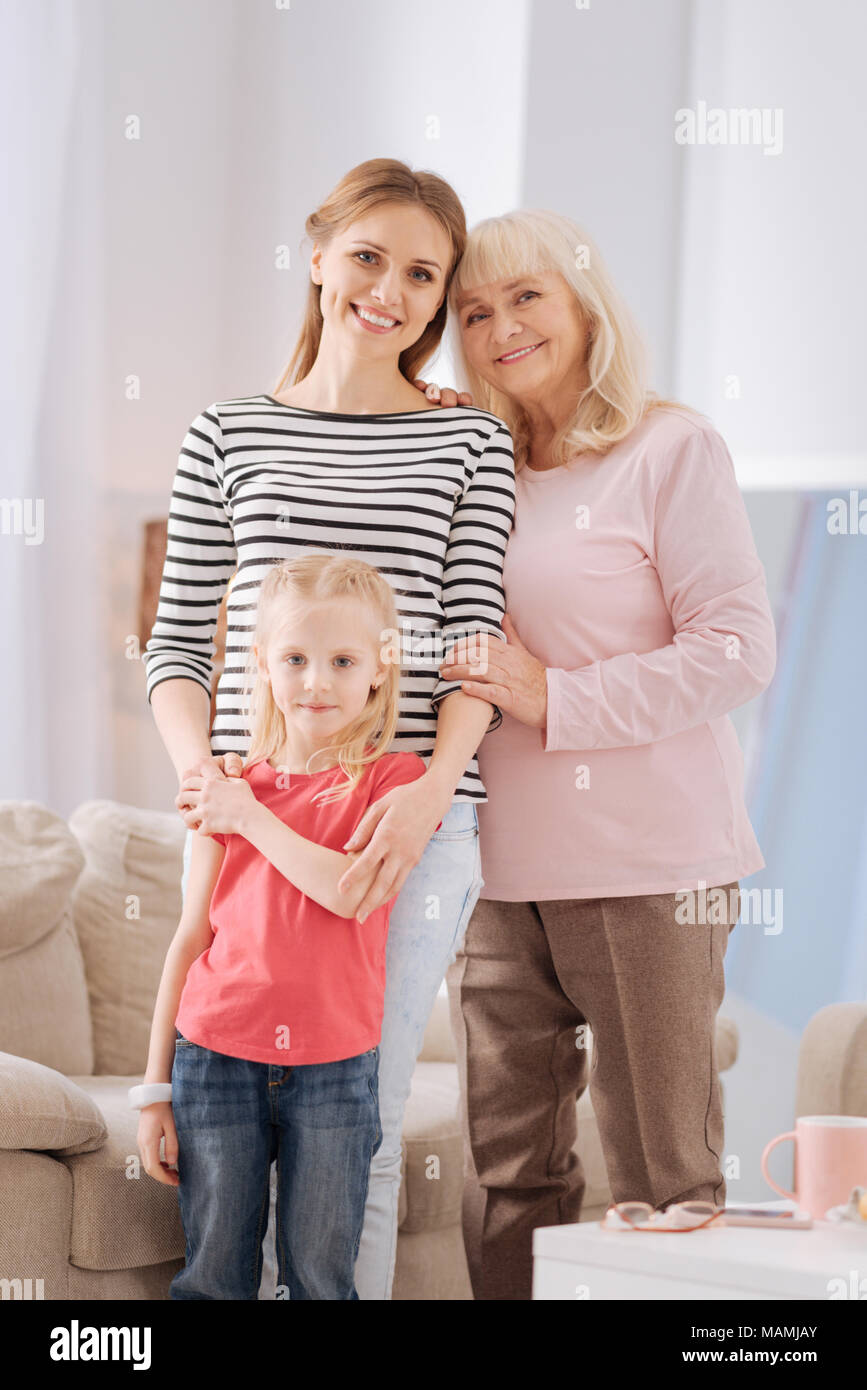Nice happy family standing together Stock Photo Alamy
