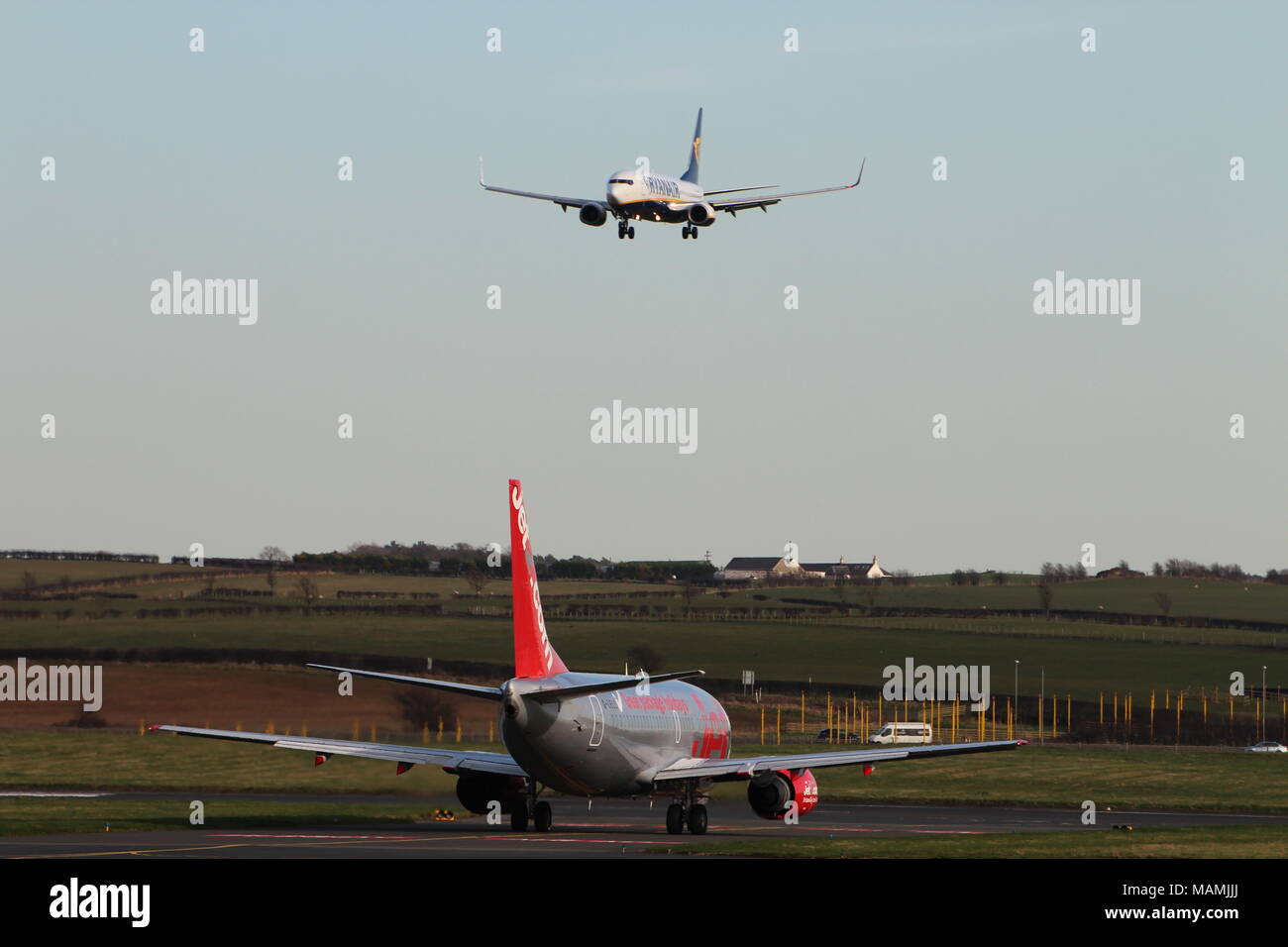Airline rivals - a Ryanair Boeing 737 comes into land at Prestwick ...