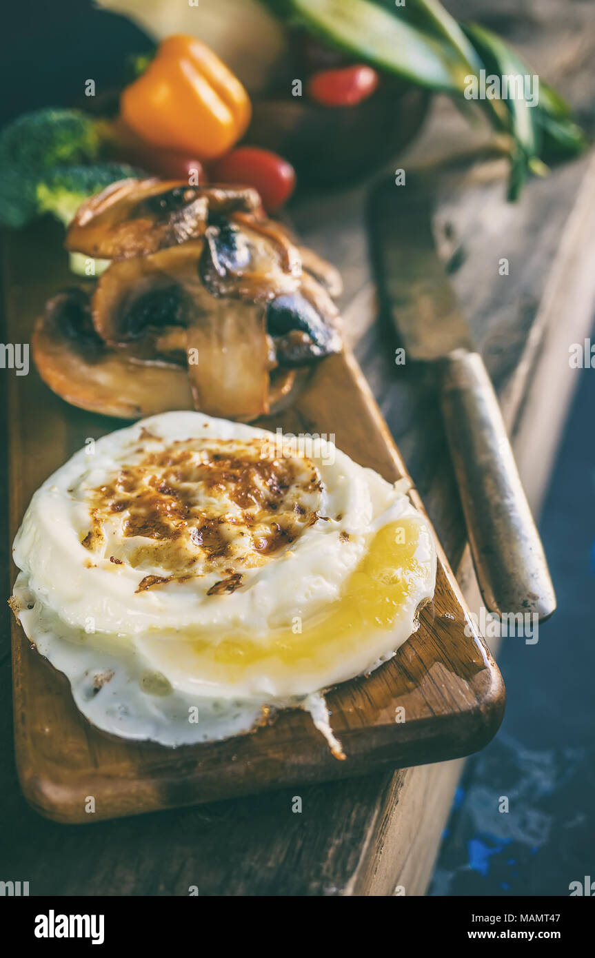 Breakfast eggs Benedict poached egg with panfried mushrooms and