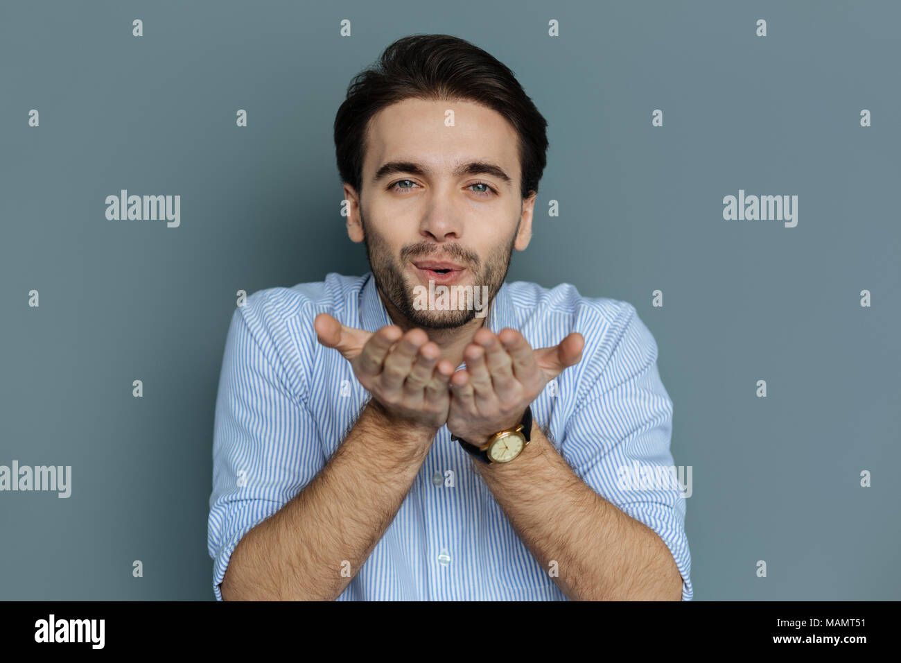 Delighted happy man expressing his feelings Stock Photo - Alamy