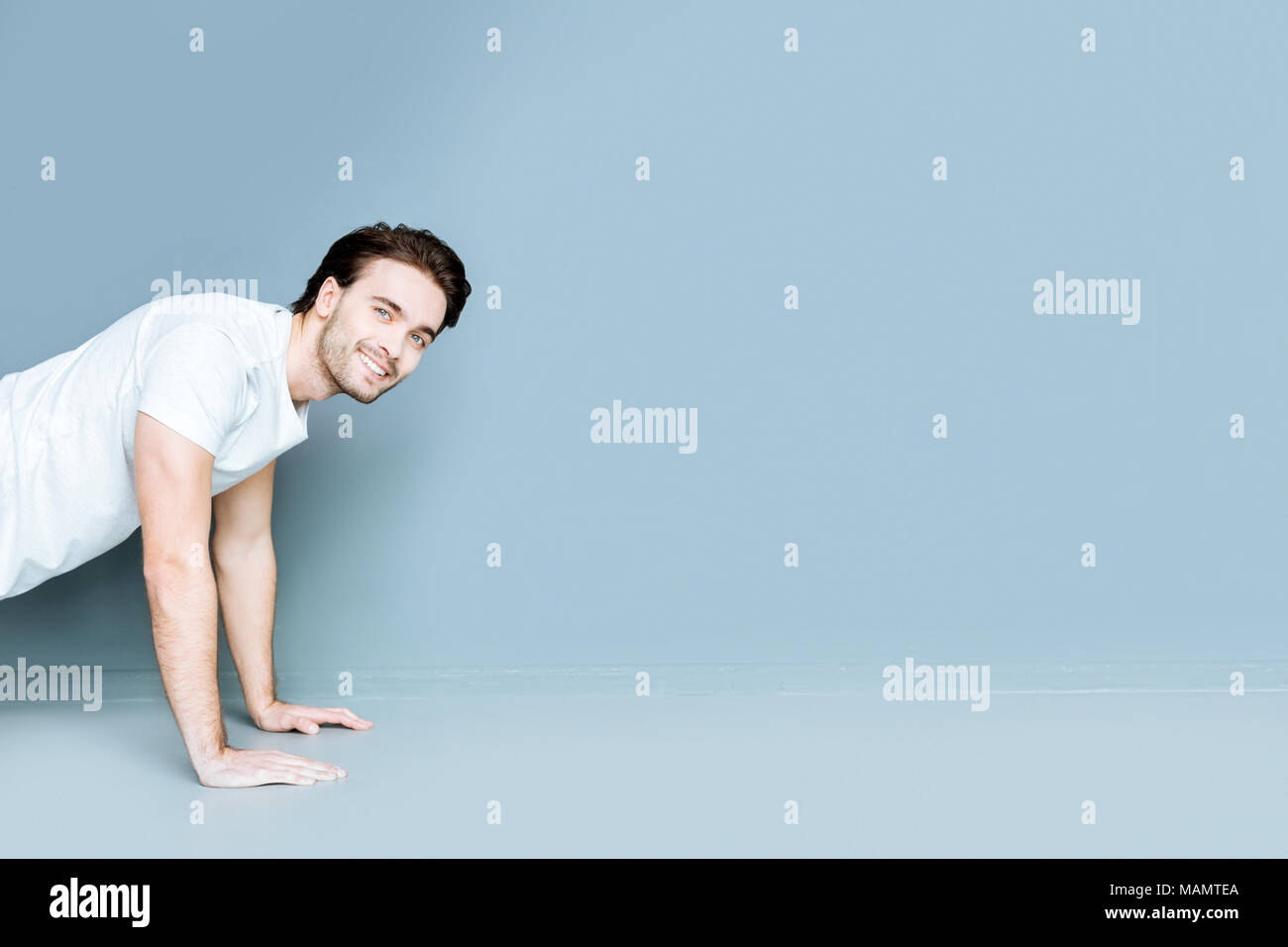 Nice strong man doing pushups Stock Photo