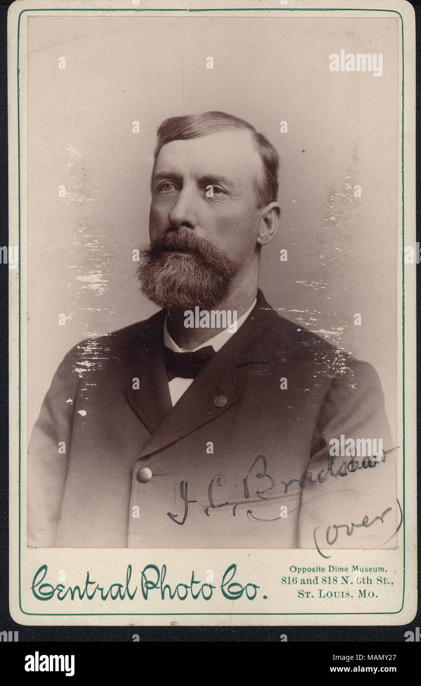 Formal bust portrait of J. C. Bradshaw wearing a suit and bow tie, and