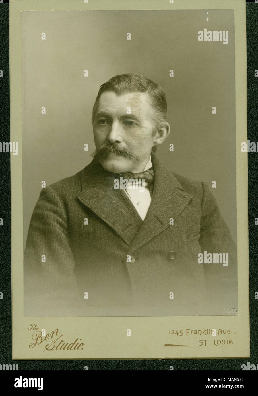 Formal bust portrait of an unidentified Union veteran wearing a suit