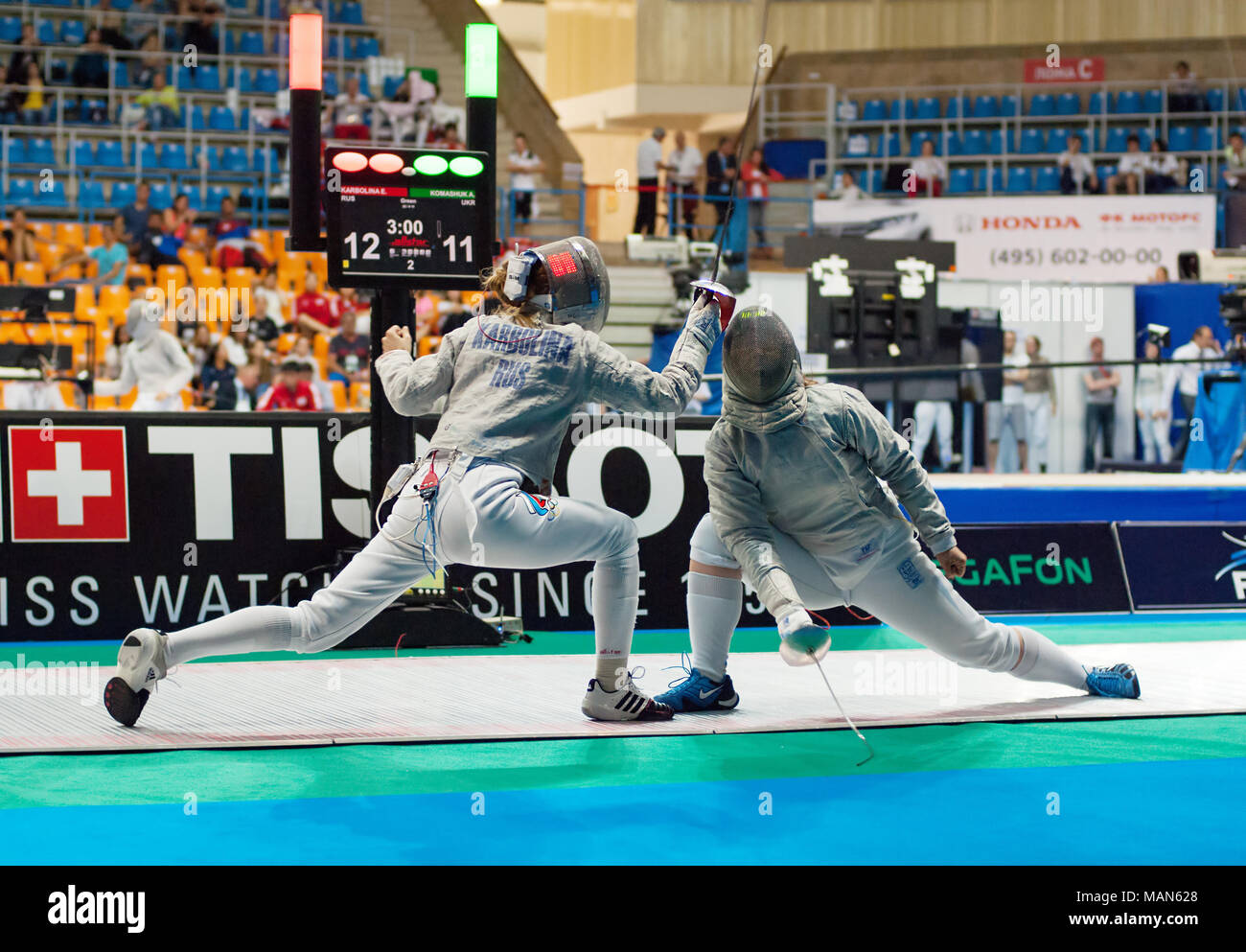 https://c8.alamy.com/comp/MAN628/moscow-russia-may-31-2015-alina-komashuk-versus-eugenia-karbolina-on-the-world-fencing-grand-prix-moscow-saber-in-luzhniki-sport-palace-MAN628.jpg