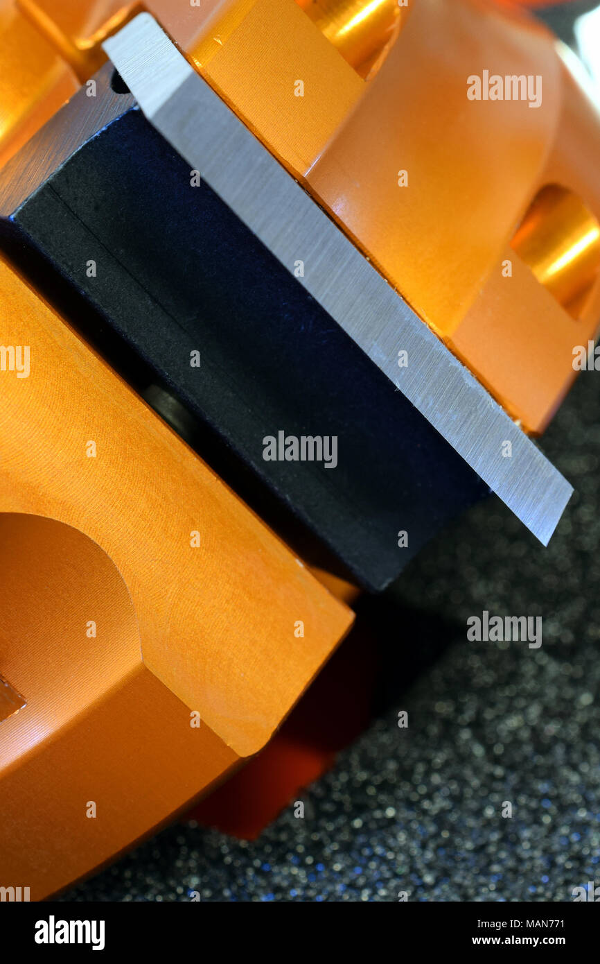 Shaper cutter head for spindle moulder machine. Vertical close up image Stock Photo