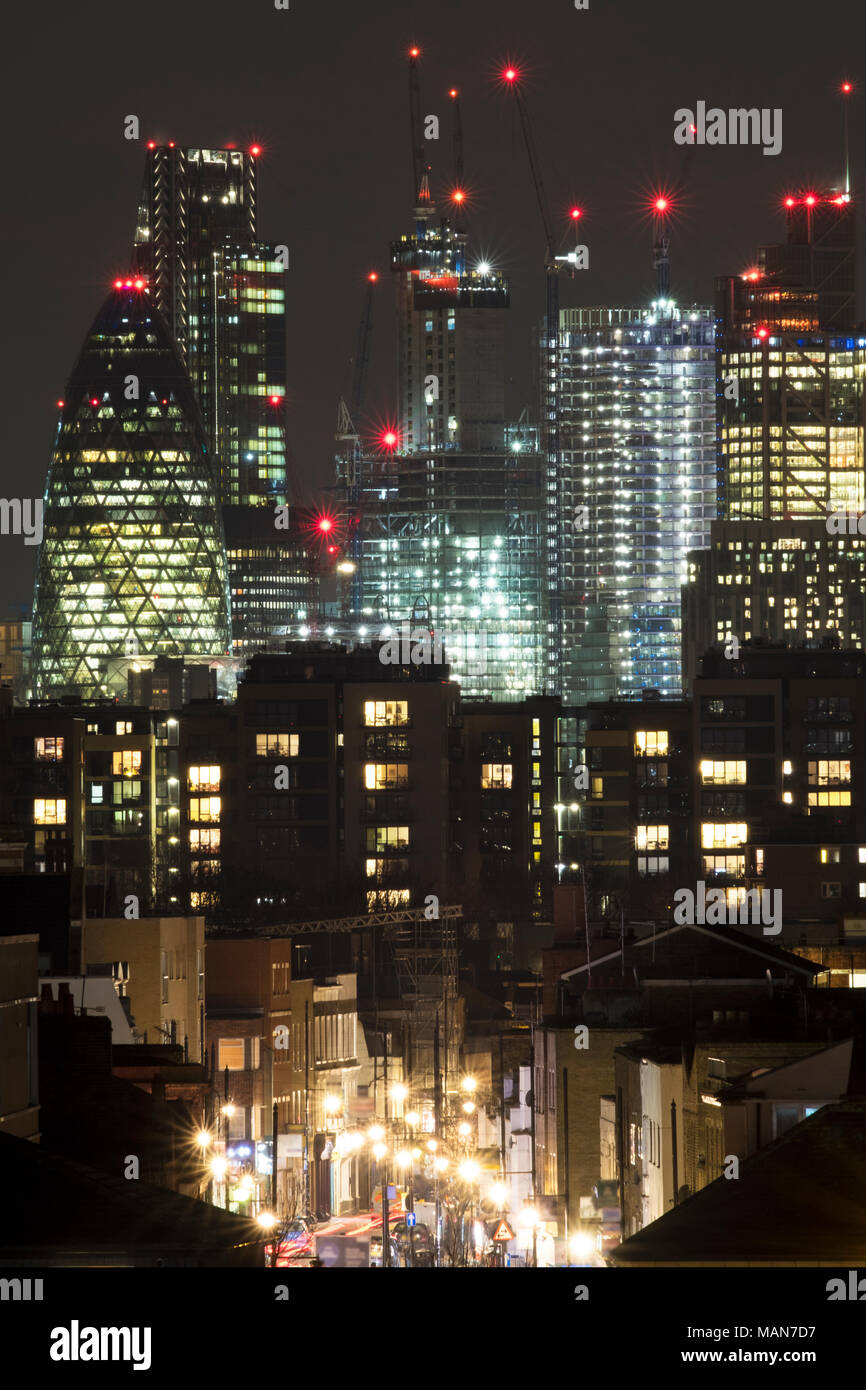 City of London at night, showing the different building heights and layers of London, and the variety of different lights that construct the skyline Stock Photo