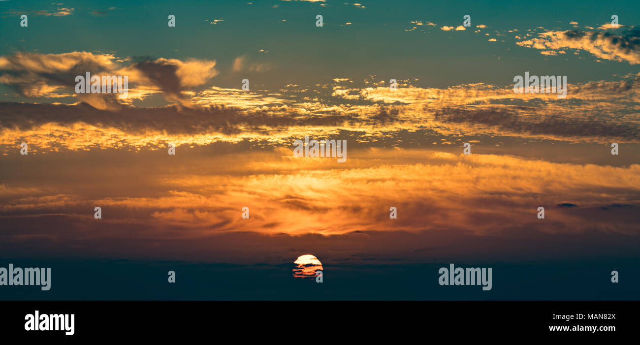 Dramatic sunset sky with clouds Stock Photo - Alamy