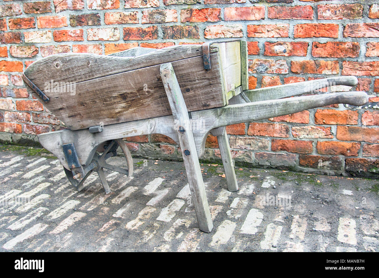 Wooden Wheel Barrow With Flat Tyre Stock Photo 178720069 Alamy